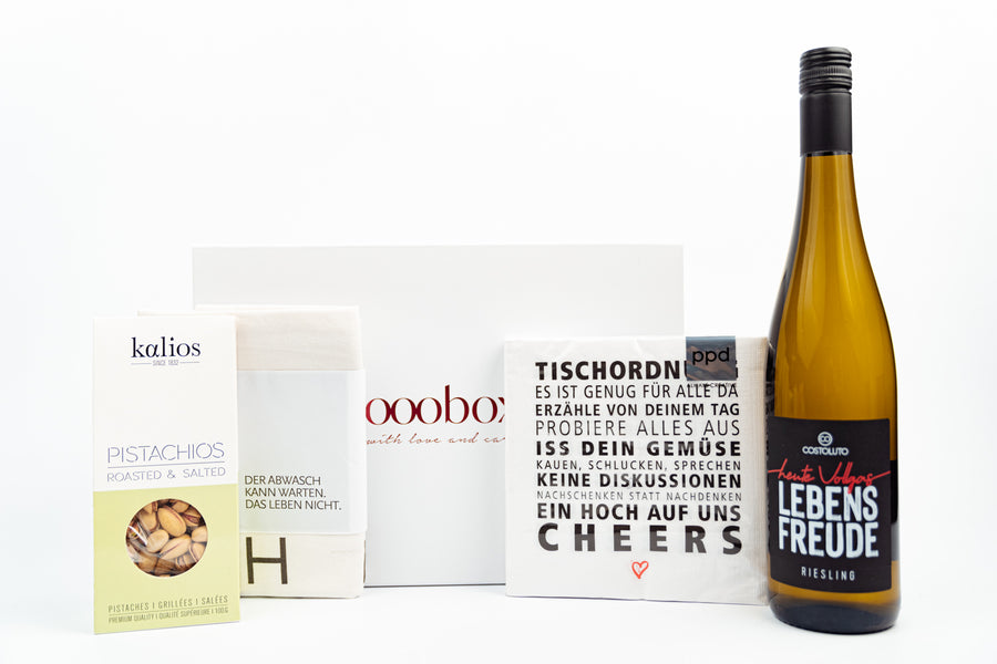 Geschenkbox Lebensfreude mit Wein, Servietten und Pistazien