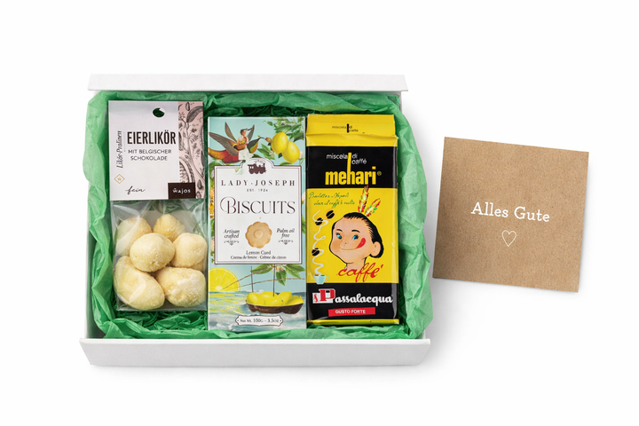 Oster-Geschenkbox mit italienischem Kaffee und süßen Leckereien