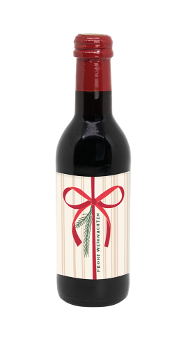 Kleine Flasche Glühwein mit der Aufschrift "Frohe Weihnachten"