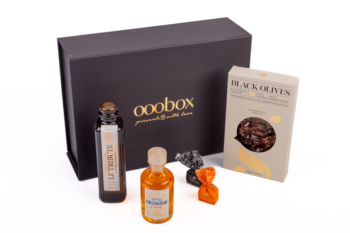 Geschenkbox "Simply the best" mit Gin, Tonic, Schokolade und Oliven